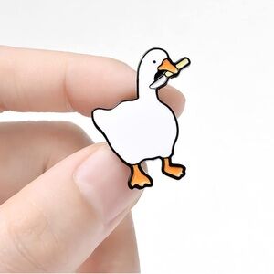 NEW IN PACKAGING - Goose “Knife Fight” Enamel Pin